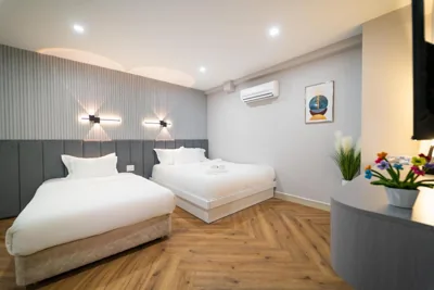 Chambre triple — Golden Suites Saigon